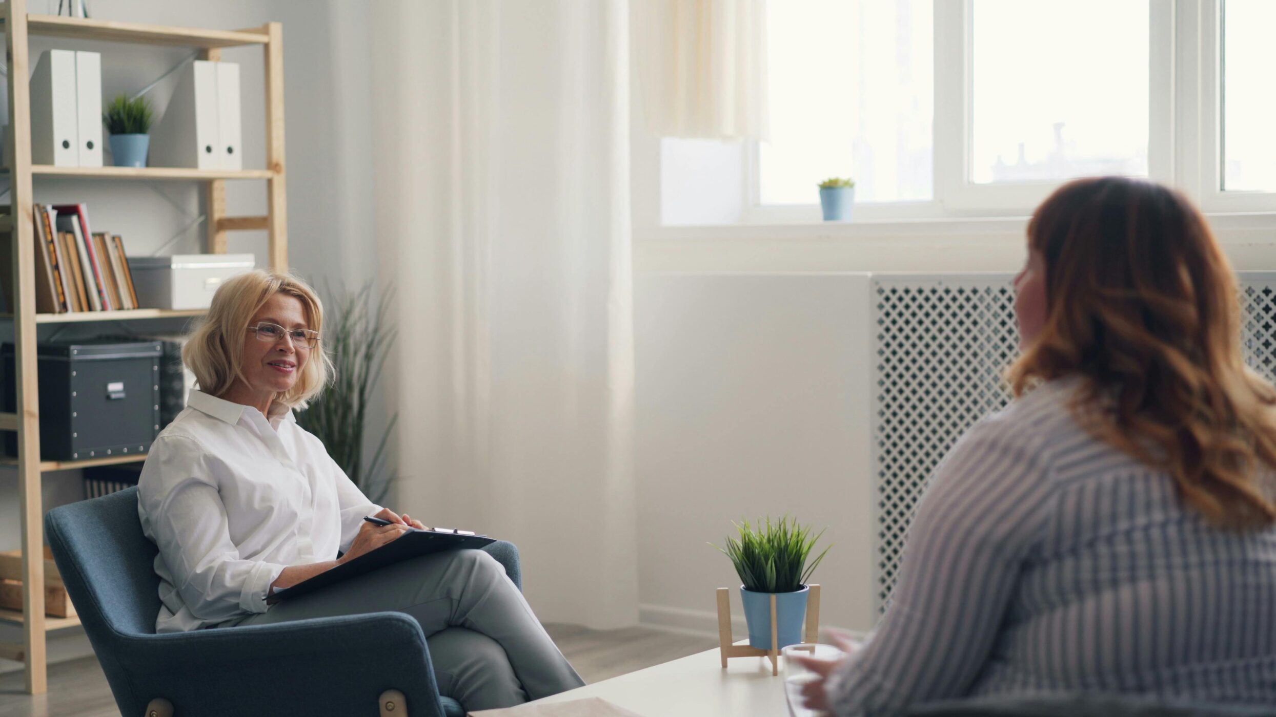 Supporting Patients Coping With Political Stress - Provider speaking with a patient